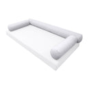 Elegant cushion and bolster set featuring refined craftsmanship and knife-edge detailing, designed for versatile indoor and outdoor comfort.