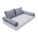 Elegant cushion and bolster set featuring refined craftsmanship and knife-edge detailing, designed for versatile indoor and outdoor comfort.