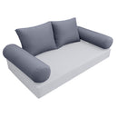 Elegant cushion and bolster set featuring refined craftsmanship and knife-edge detailing, designed for versatile indoor and outdoor comfort