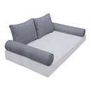 Elegant cushion and bolster set featuring refined craftsmanship and knife-edge detailing, designed for versatile indoor and outdoor comfort.
