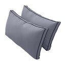 Pillow and bolster cushions displayed on an outdoor porch swing for a cozy, elegant setting.