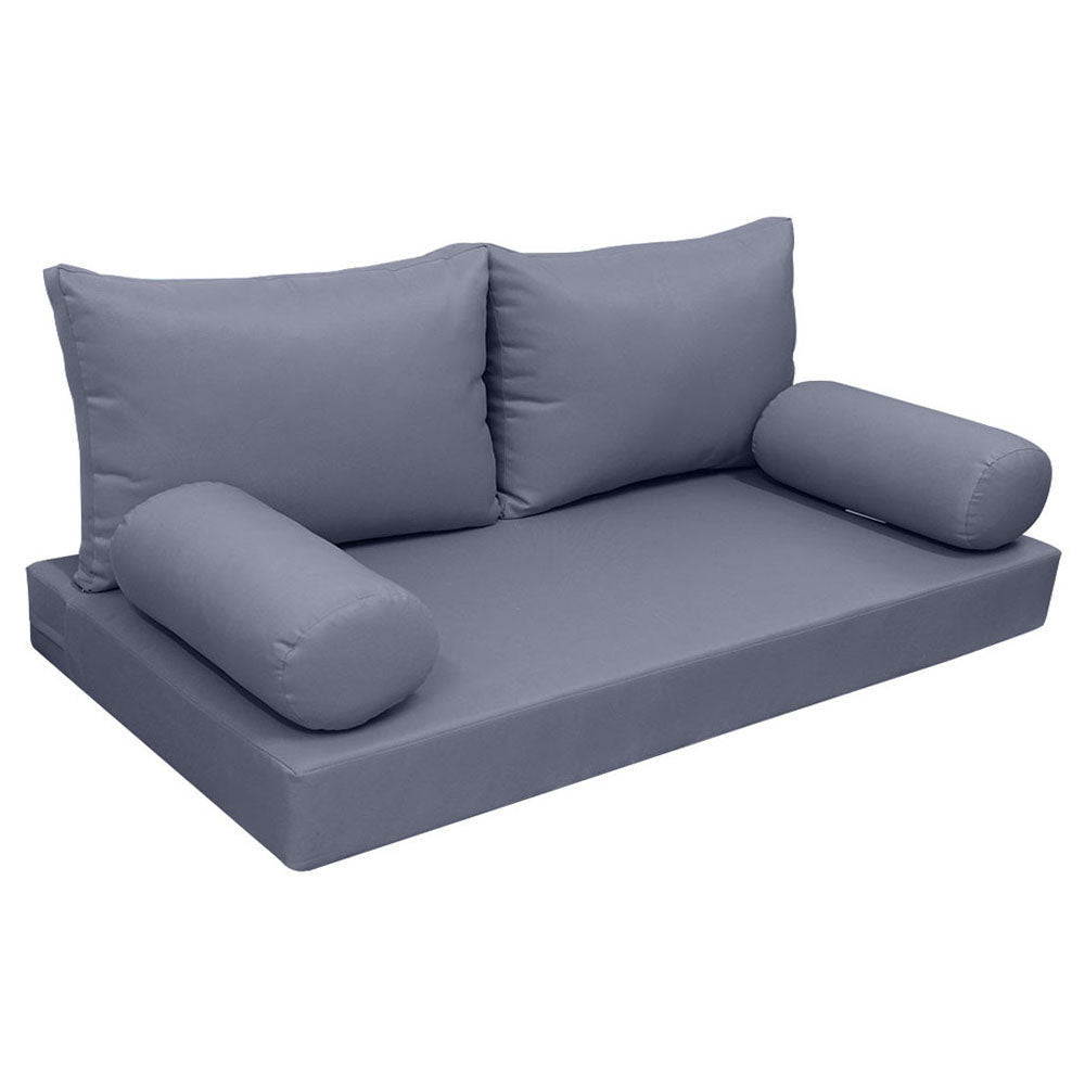 Elegant cushion and bolster set featuring refined craftsmanship and knife-edge detailing, designed for versatile indoor and outdoor comfor