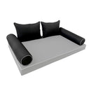 Elegant cushion and bolster set featuring refined craftsmanship and knife-edge detailing, designed for versatile indoor and outdoor comfort.