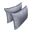 Pillow and bolster cushions displayed on an outdoor porch swing for a cozy, elegant setting.